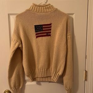 Woman’s Polo sweater size large cream turtleneck with red and blue flag